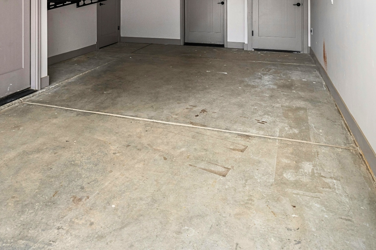 A Bare Concrete Floor Can Hold Your Entire Space Back Expert Garage Floor Flakes RDP Epoxy and Floor Coatings Michigan