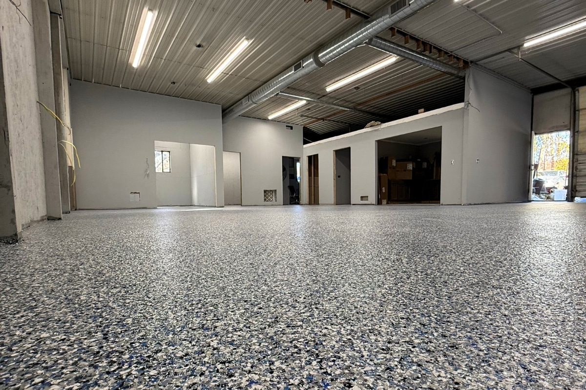 A Bare Concrete Floor Can Hold Your Entire Space Back Local Garage Floor Flakes RDP Epoxy and Floor Coatings Michigan